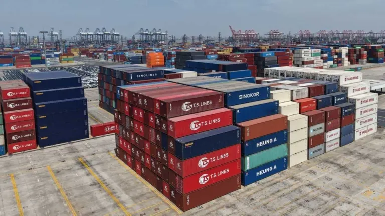 Stacks of shipping containers at a port