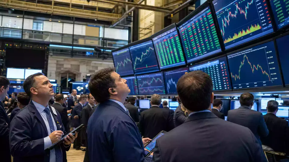 Traders watching market screens