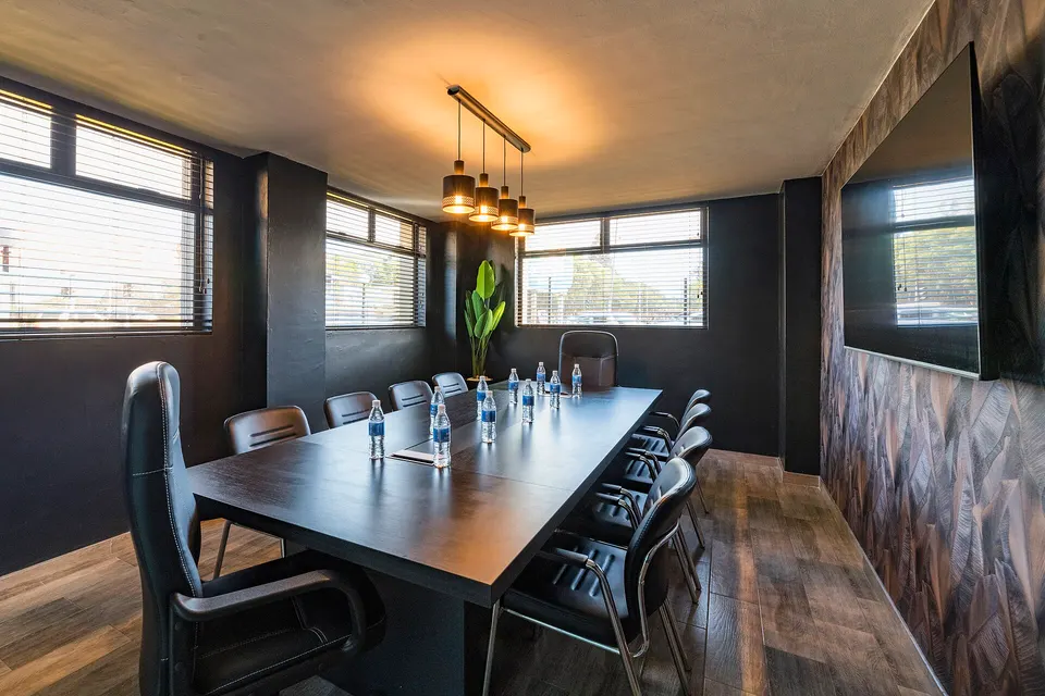 Corporate meeting room with participants at a table