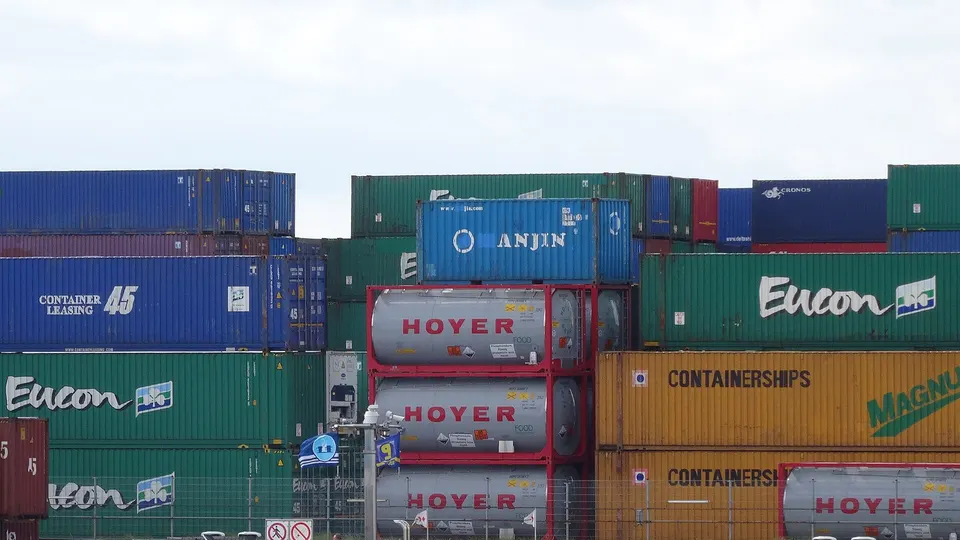 Container cranes at a busy port