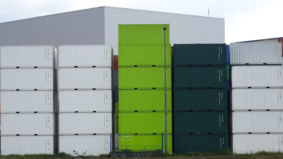 Shipping containers at a busy port