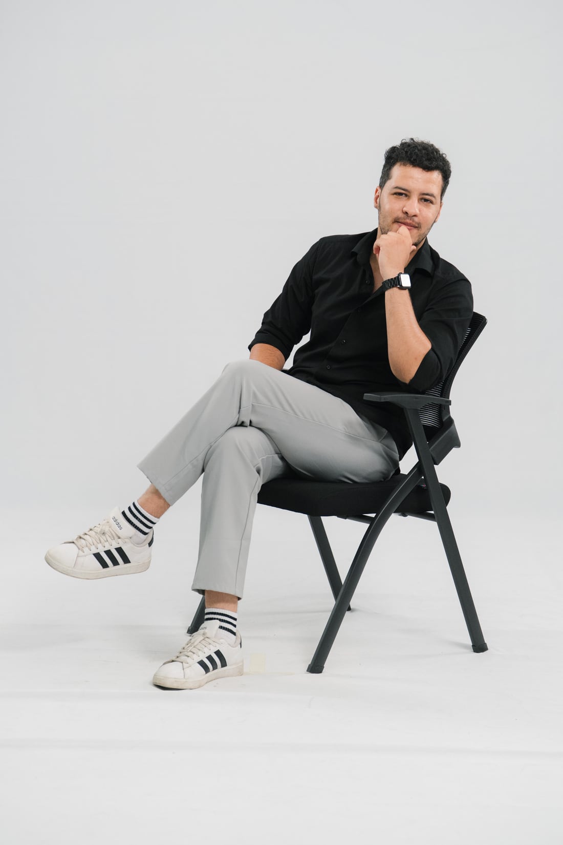 Nasri Mohammed seated in the studio